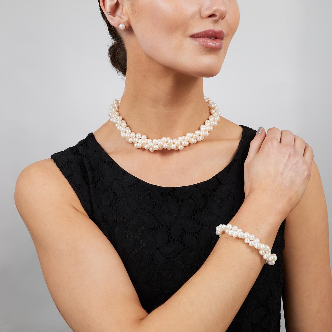 Triple Row AA Grade 7mm White Freshater Pearl Necklace Displayed on Model