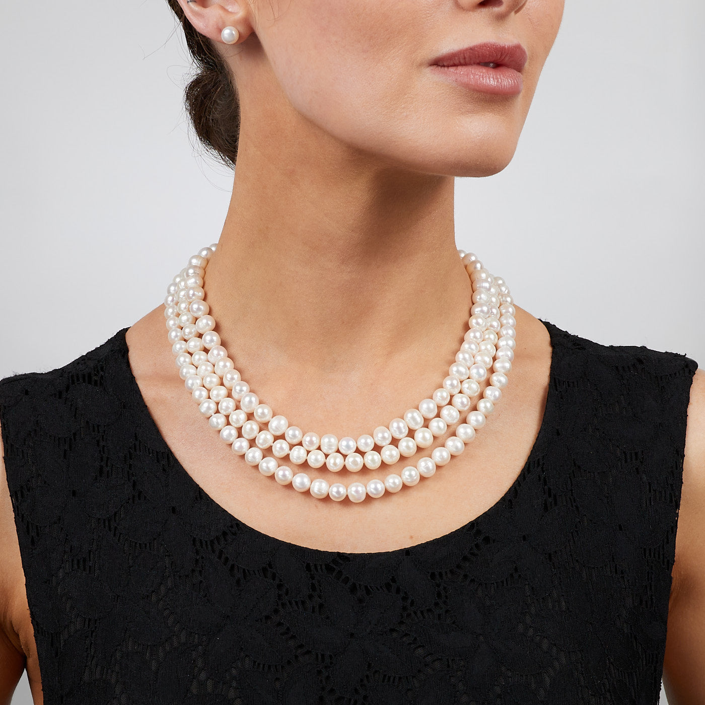 three-row white pearl necklace
