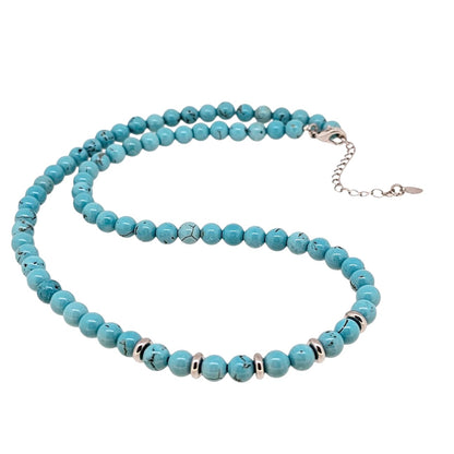 Round Blue Turquoise Beaded Gemstone Necklace Against a White Background