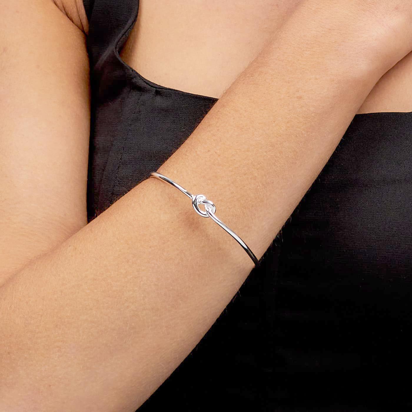 Women's 925 sterling silver sleek knot bangle bracelet