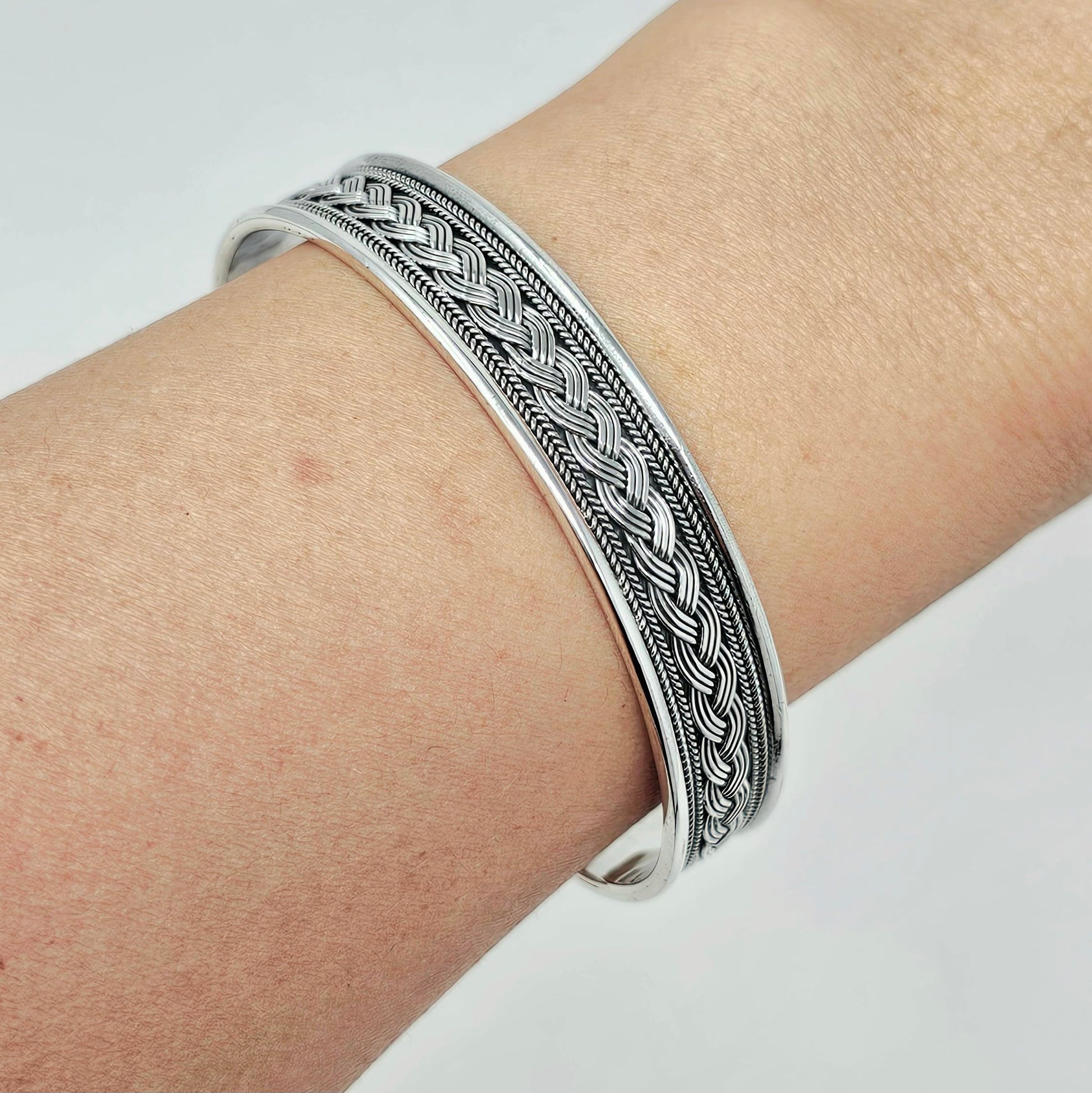 Braided details open cuff 925 sterling silver bangle bracelet for men on model 2